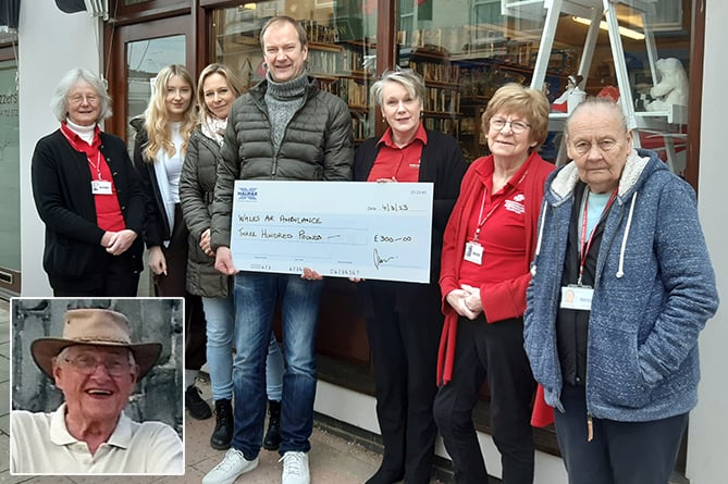 Richard Baron and his family present a cheque to shop staff in memory of David (inset)