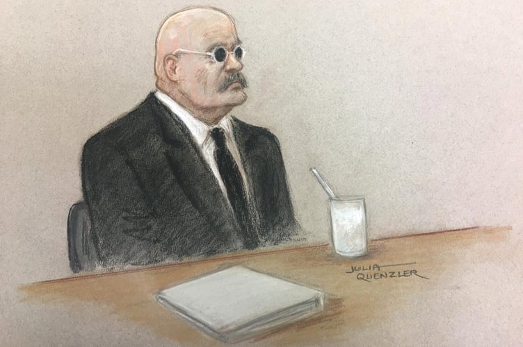 **TV Out** Prisoner Charles Bronson is seen in his trademerk glasses during a public parole hearing, March 6 2023. Charles Bronson, one of the UK's longest-serving prisoners, would not cope with being released, a Parole Board panel has heard. The 70-year-old, one of the UK's most violent offenders, has been in prison for much of the last 50 years.