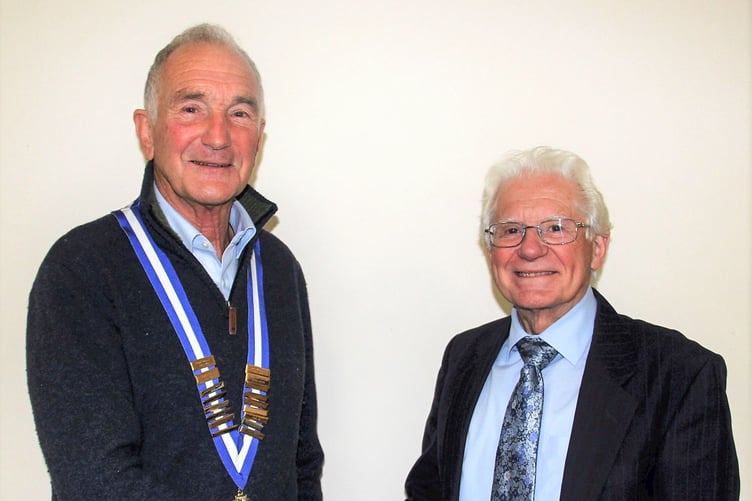 New Aberystwyth Probus president Chris Fletcher (left) thanks outgoing president Colin Eldridge