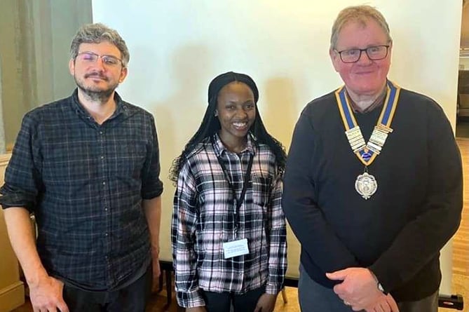 Ben Freeman from DASH, Habi Bah of Rotaract and Hywel Davies, Aberystwyth Rotary Club president