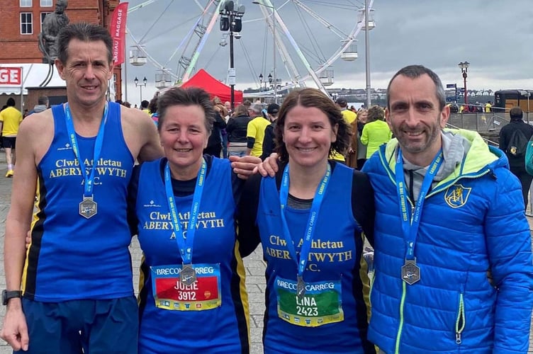 Paul Williams, Julie Williams, Lina Land, and Edd Land at Cardiff 10k 240323