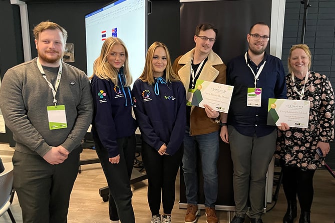 Representatives from Grŵp Llandrillo Menai were presented with certificates of recognition at the National Union of Students Wales conference in Bangor