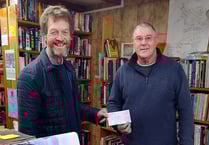Community bookshop donates £500 to Ceredigion Badger Group