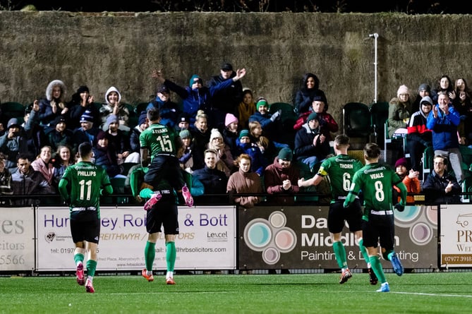 ABERYSTWYTH, WALES - 01 FEBRUARY 2022: Aberystwyth's Matthew Jones scores a goal from the penalty spot to make it 2-0 and celebrates during the JD Cymru Premier league fixture between Aberystwyth Town F.C & Haverfordwest County A.F.C and  Aberystwythâs 1000th league game in the Cymru premier devision, Park Avenue Stadium, February 1st, 2022, Aberystwyth, Wales (Pic By John Smith/FAW)