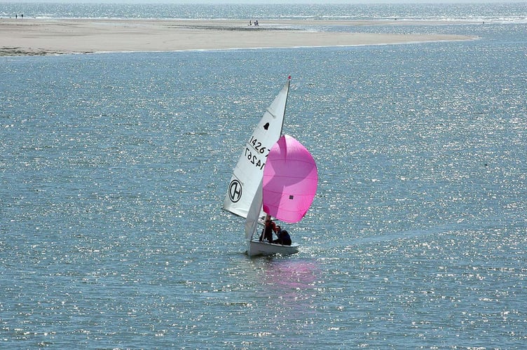 Dovey Yacht Club members Dave and Diane Chell sailing their GP14 during the last race of the Spring Cup series on the Dyfi estuary at Aberdyfi on Monday