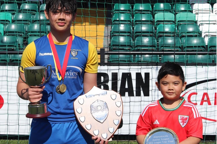 Dhayne Licerio U13 Cup Player of the Match Ystwyth Dragons pictured with his little brother