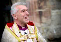 Archbishop volunteers for Big Help Out by cleaning Gwynedd beach
