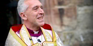 Archbishop volunteers for Big Help Out by cleaning Gwynedd beach