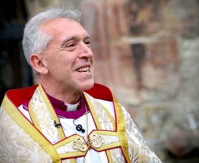 Archbishop volunteers for Big Help Out by cleaning Gwynedd beach