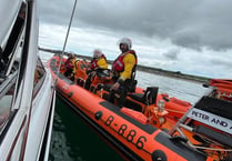 RNLI rescue nine after boat suffers engine problem