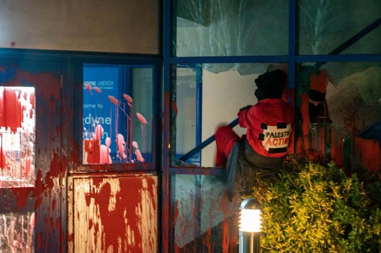 Palestine Action activists storming the site