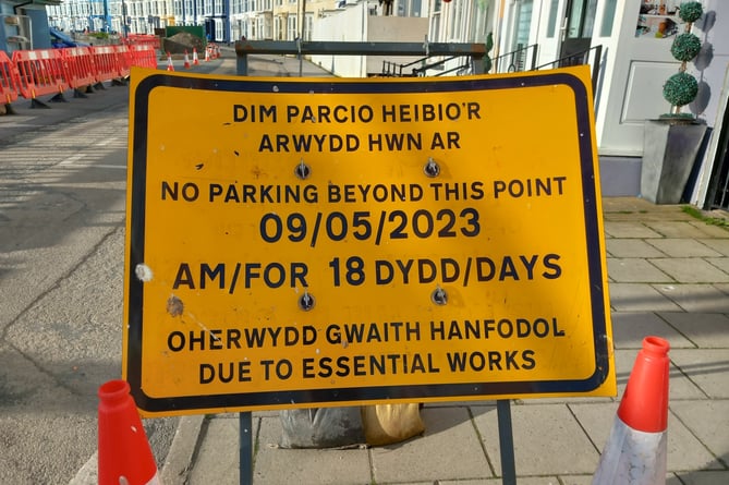 Signs on Aberystwyth promenade show where people cannot park during the work