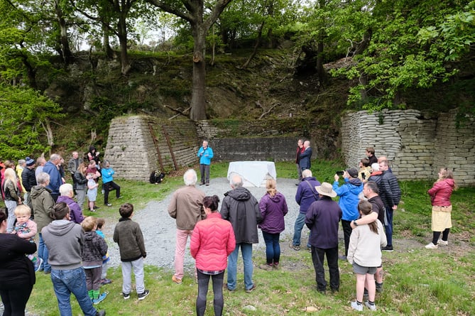 A crowd gathered for the unveiling of the memorial to Cooke's staff in Penrhyndeudraeth