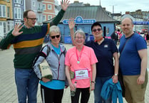 Julie welcomed across the finish line in style by fellow bellringers