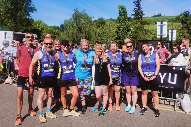 Aber runners celebrate in the sunshine after the Newtown 10k 310523.jpg