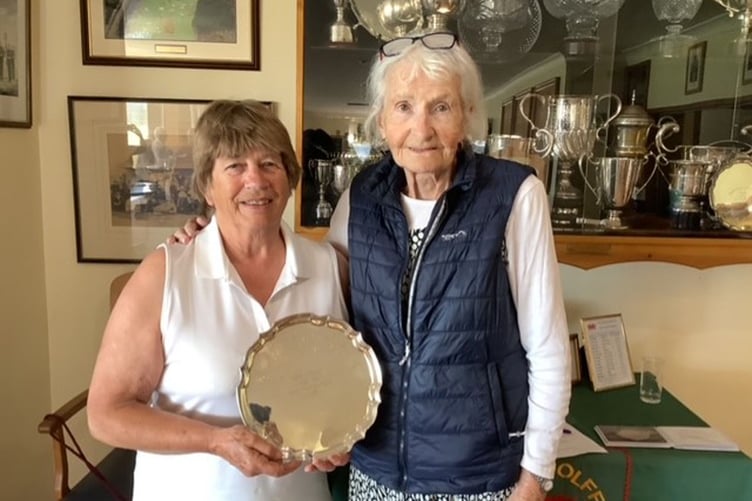 Kathy Price (left) being presented with the Griffiths Salver by Captain Lynda Evans Borth & Ynyslas Golf Clun 070623