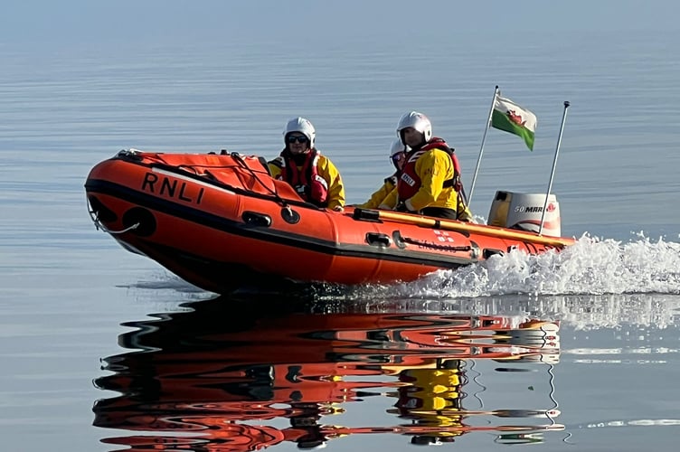Pwllheli RNLI Inshore D-Class lifeboat rescued four stranded youths