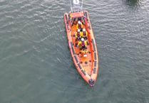 RNLI called out to teenage paddleboarders and sea sick rower