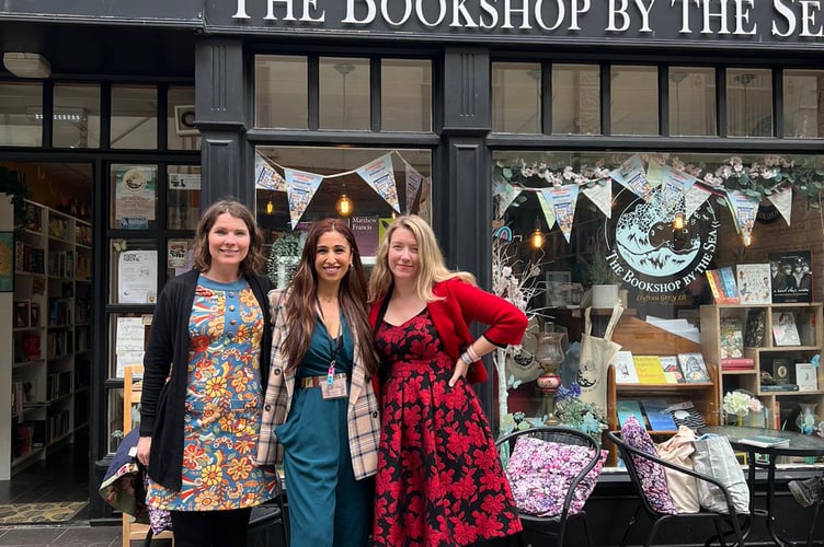 Poets Zoe Brigley and Rhian Williams bookshop owner and festival organiser, Freya Blyth, centre