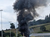 Fire brigade dealing with 'ongoing incident' at car body repair shop