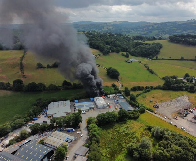 Drone footage shows fire at body repair business