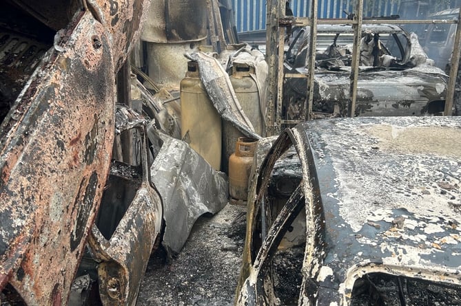 The fire damaged vehicles at the site