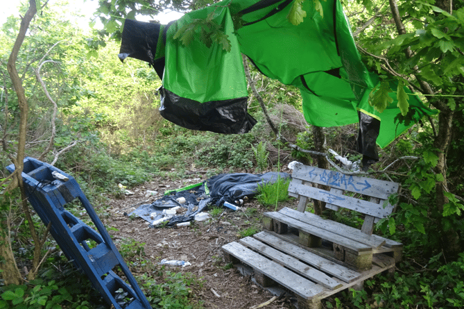 A campsite left in Parc Nature Penglais by authorities