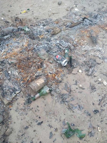 The remains of the bonfire in the conservation area