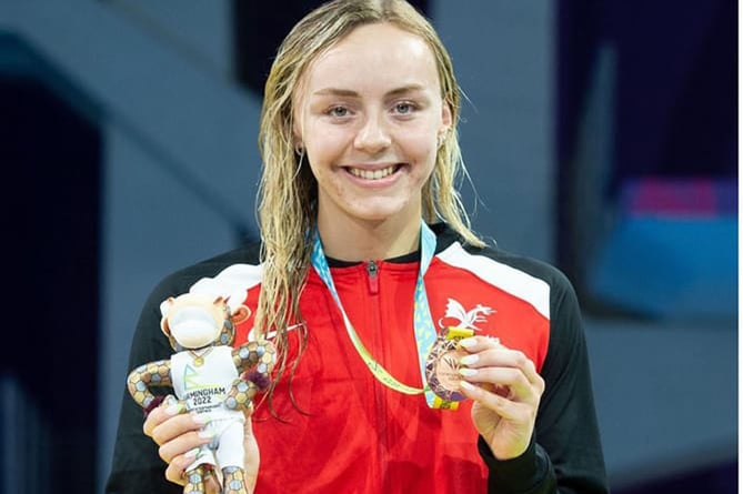 Successful swimmer Medi Harris with her Commonwealth Games 100m backstroke bronze medal 