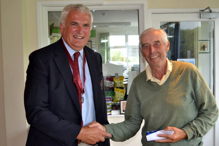 Aberystwyth Golf Club Captain Arwyn Morris awarding JAV Roberts overall winner