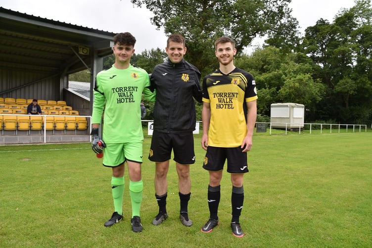Dolgellau first team manager Rob Evans with new signings Tyler Andrews and Sion Hughes 120723