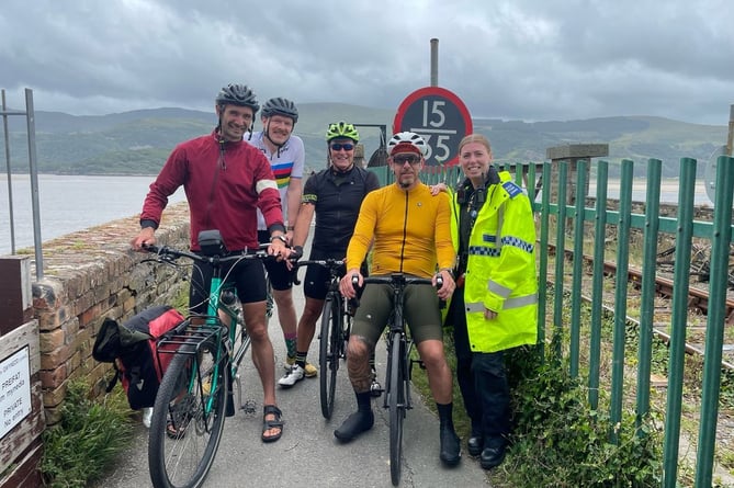Xani is pictured here on his tandem, with Dion, Dave, Eoghann and PCSO Shannon