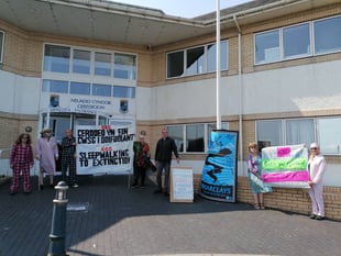 Eco campaigners protest outside council