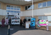 Eco campaigners protest outside council