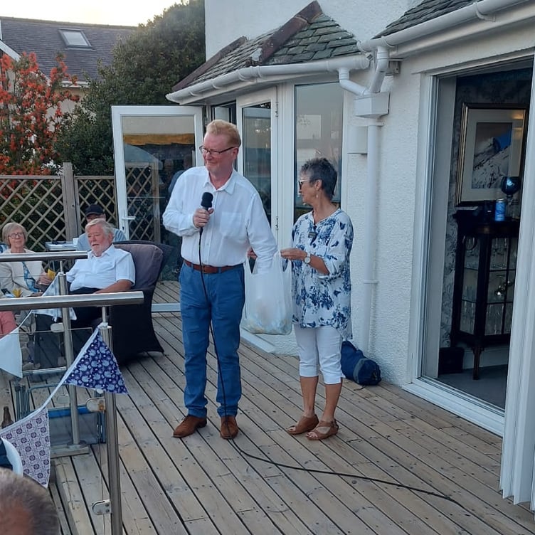 Station manager Andy Smith and station secretary Chris Harris draw the raffle