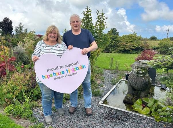 Nonni and David Goadby in their beautiful Bryncroes garden