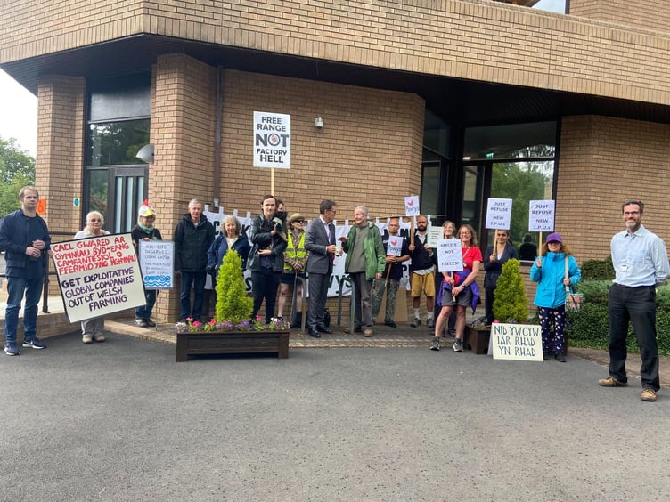 Protestors outside the Powys County Council House in Llandindrod