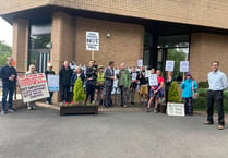 Opponents of chicken farm plans join protest outside Council House