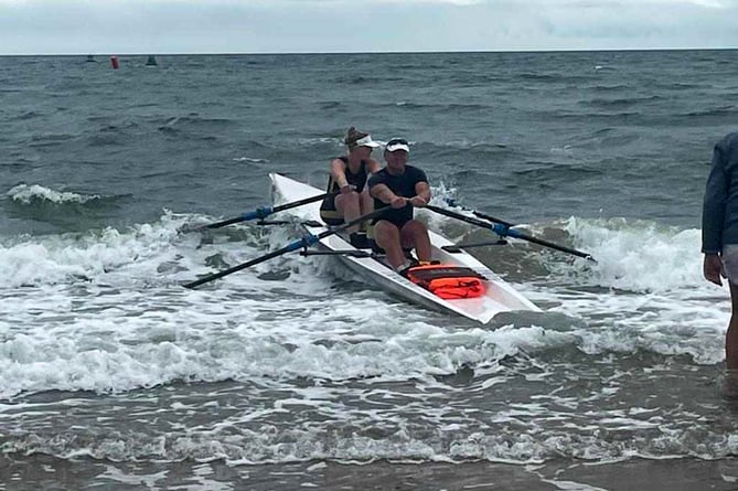 Tim Chesworth and Chloe Evans at the beach start of the mixed doubles. British Coastal rowing championship 2023