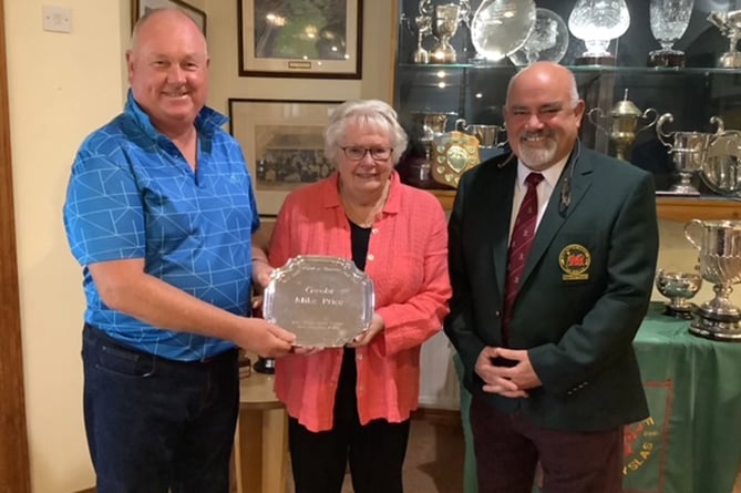 Harri Jones receiving the Salver from the captain and Letty Price