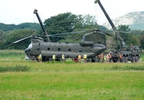 Chinook helicopter expected take flight today after a week in a field