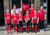 Penrhyncoch juniors get smart new kit by cinema sponsors