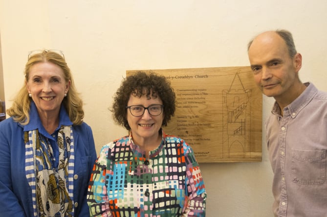 Denise Lewis-Poulton NLHF, Elin Jones AM and Peter Garson by plaque commemorating new stairs in tower