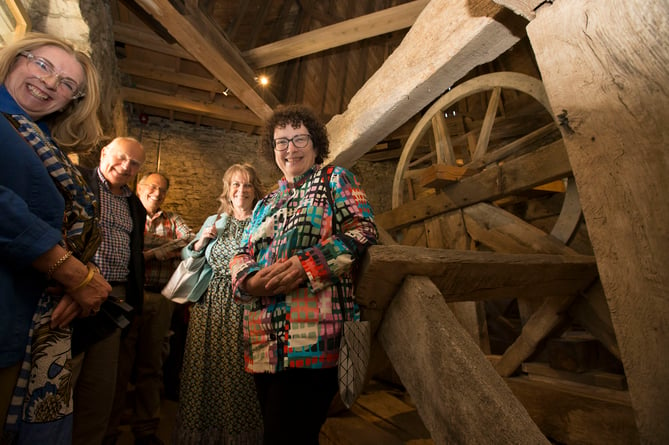 On the top floor of the tower by the medieval bell frame.  From left: Denise Lewis-Poulton NLHF, architect Frans Nicholas,  Dr Richard Suggett (RCAHMW,) Tanya Frizwell (Pentir Pumlumon) and Elin Jones 