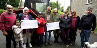 Tractor run organisers donate £750 to charities