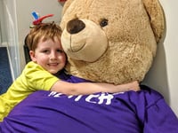WATCH: Penrhyn swimming teacher's training walk in memory of pupil, 11