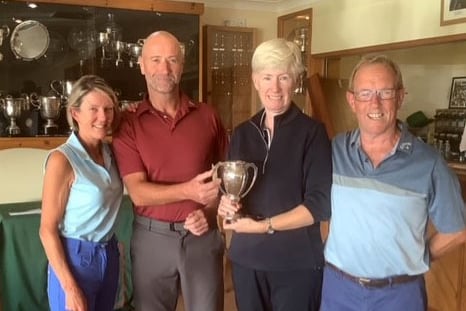 Walker Cup winners Alan Shaw and Catrin Pugh Jones (middle) being presented by Sarah and Rob Walker