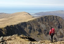 Mountaineer helped off Cader Idris after falling ill in hot weather