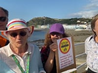Rally organisers respond to climate activists’ protest