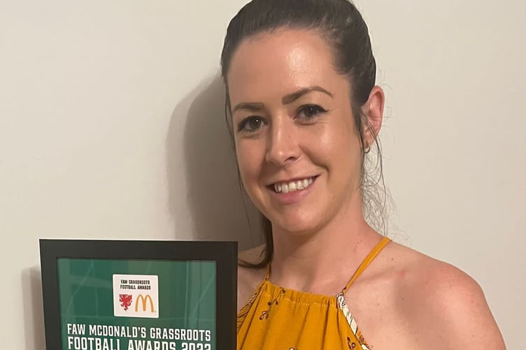 Aberystwyth Town Women club volunteer Lucie Gwilt collected the award